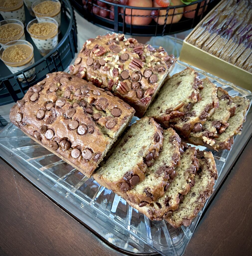  chocolate chip banana bread with a golden-brown crust and gooey chocolate chips, perfect for a delicious snack or breakfast.