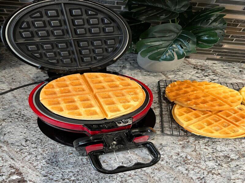 Crispy and fresh waffles cooking in the pan