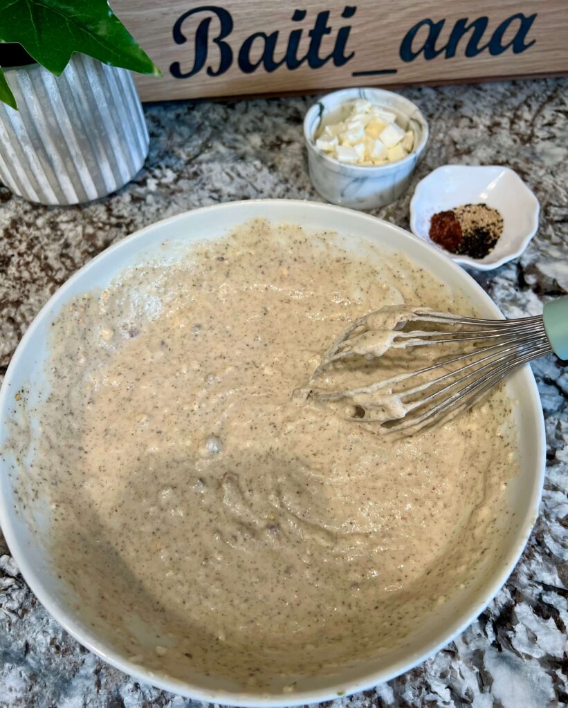 Mixing the batter for Zaatar muffins