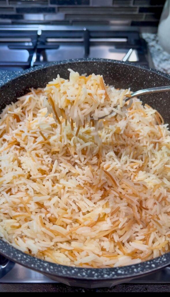 fluff the rice with a fork to separate the grains