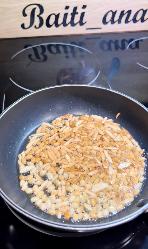 Toast nuts to top the Musakhan fatteh 