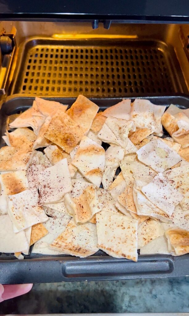 Cut and toast the bread for the Musakhan fatteh 