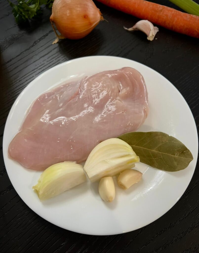 Ingredients for cooking the chicken and to make the broth 