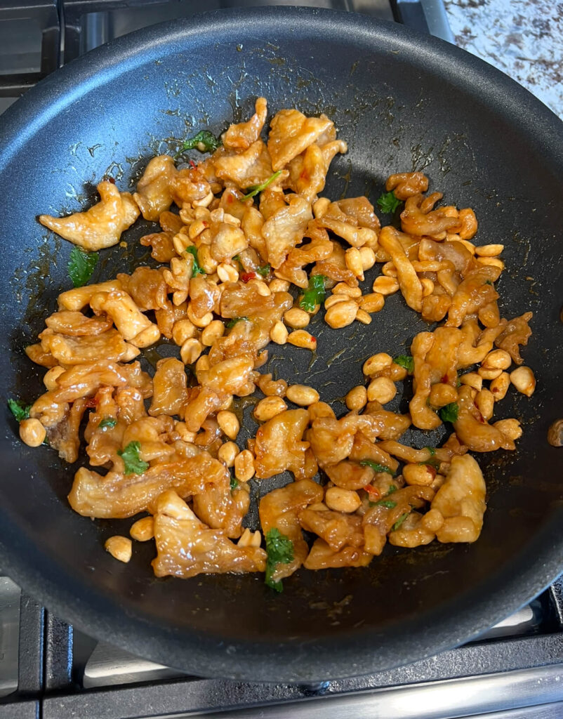 Mixing the chicken and sauce together