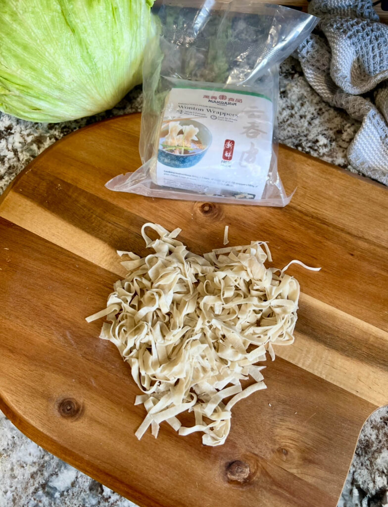 Cutting Wonton wrapper to top deep fry then to top Szechuan Lettuce Wraps