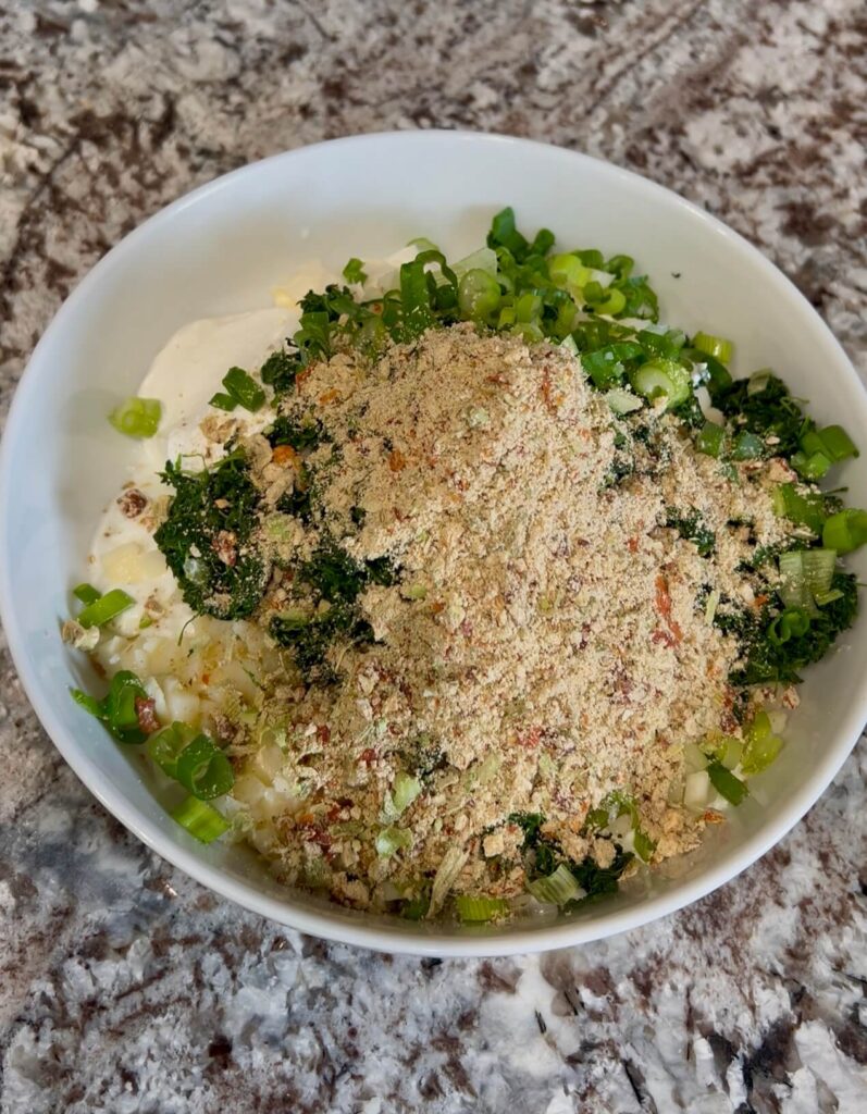 Mixing the ingredients for Spinach dip 