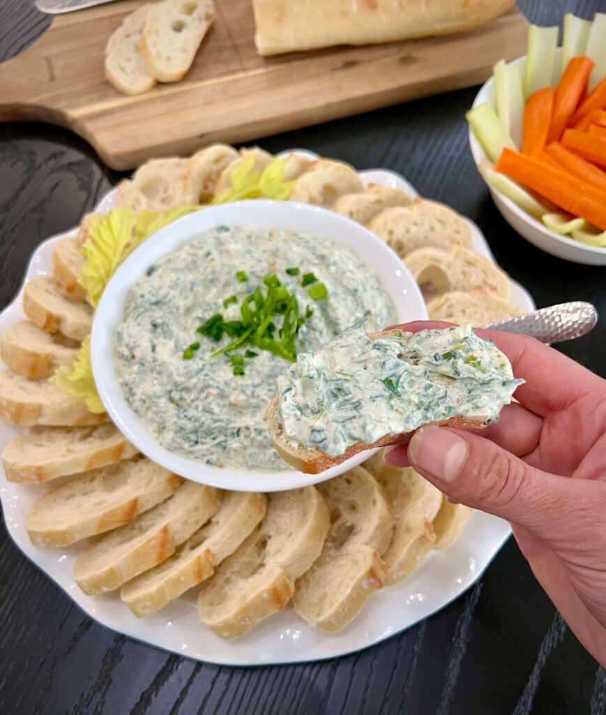 Serving Spinach dip with bread