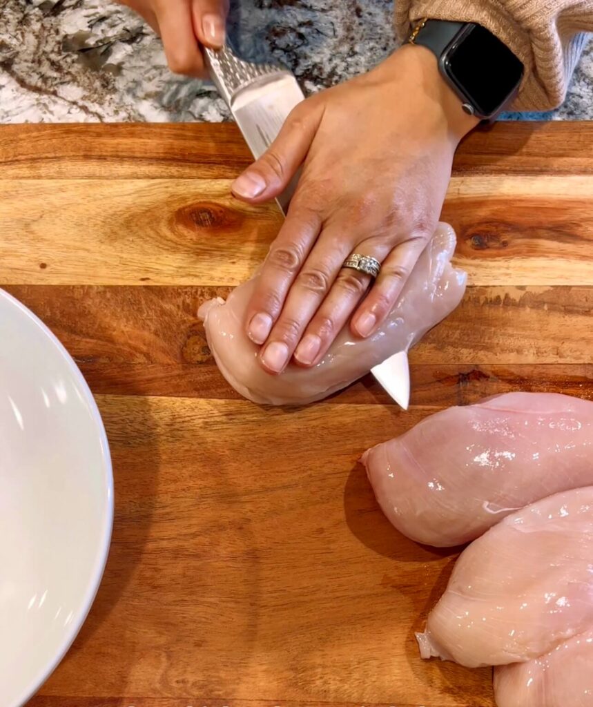 Cut the chicken breast in half 