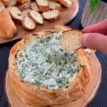 Baked spinach dip in a bread bowl
