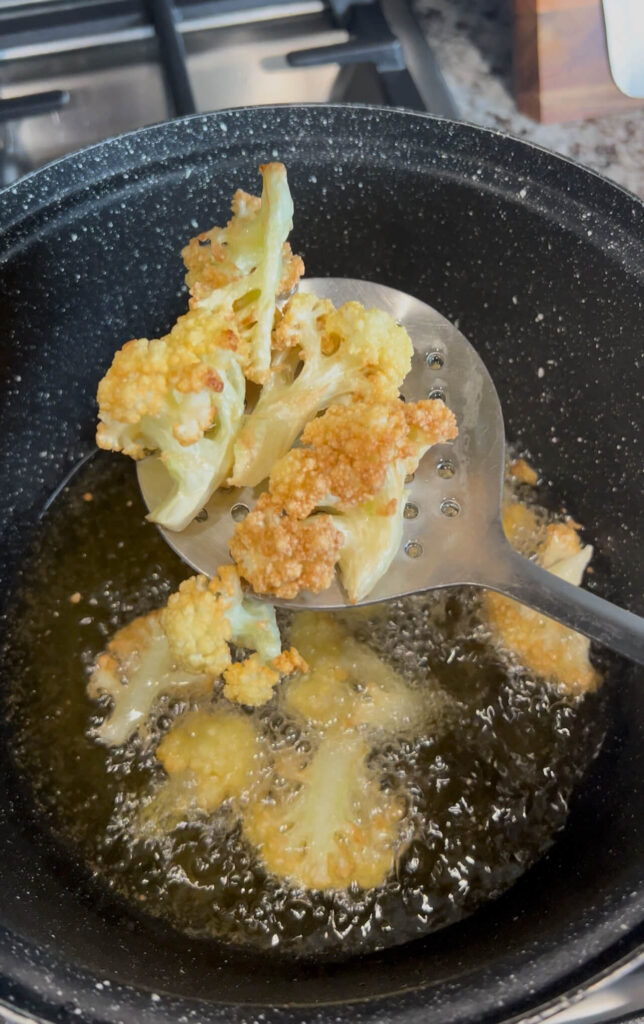Deep frying the cauliflower