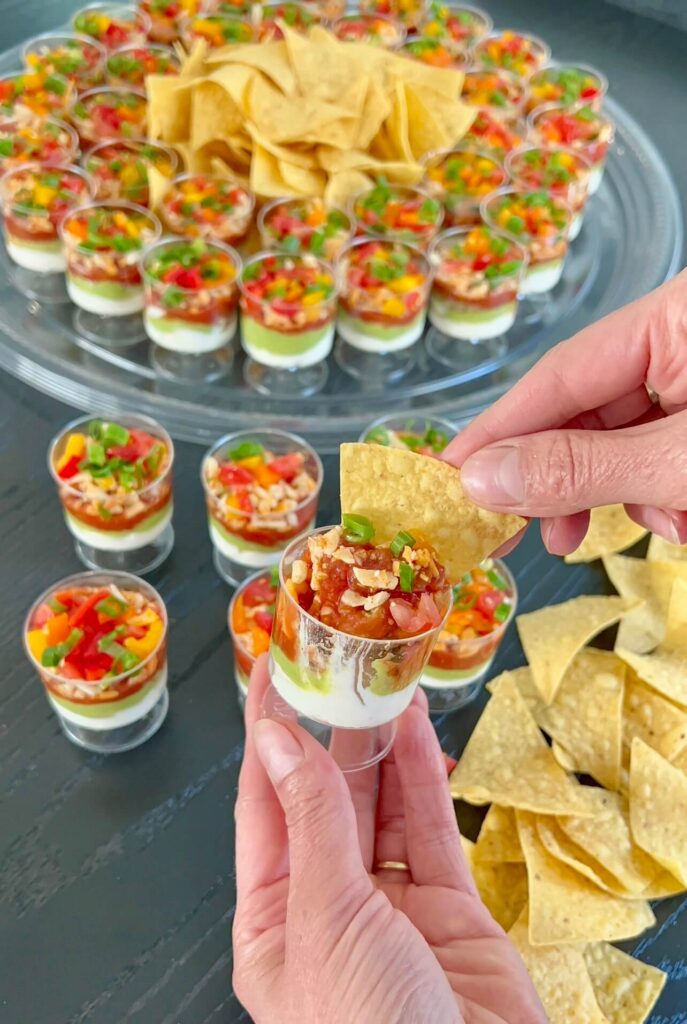 Step by step how to make 7 layer dip cups 