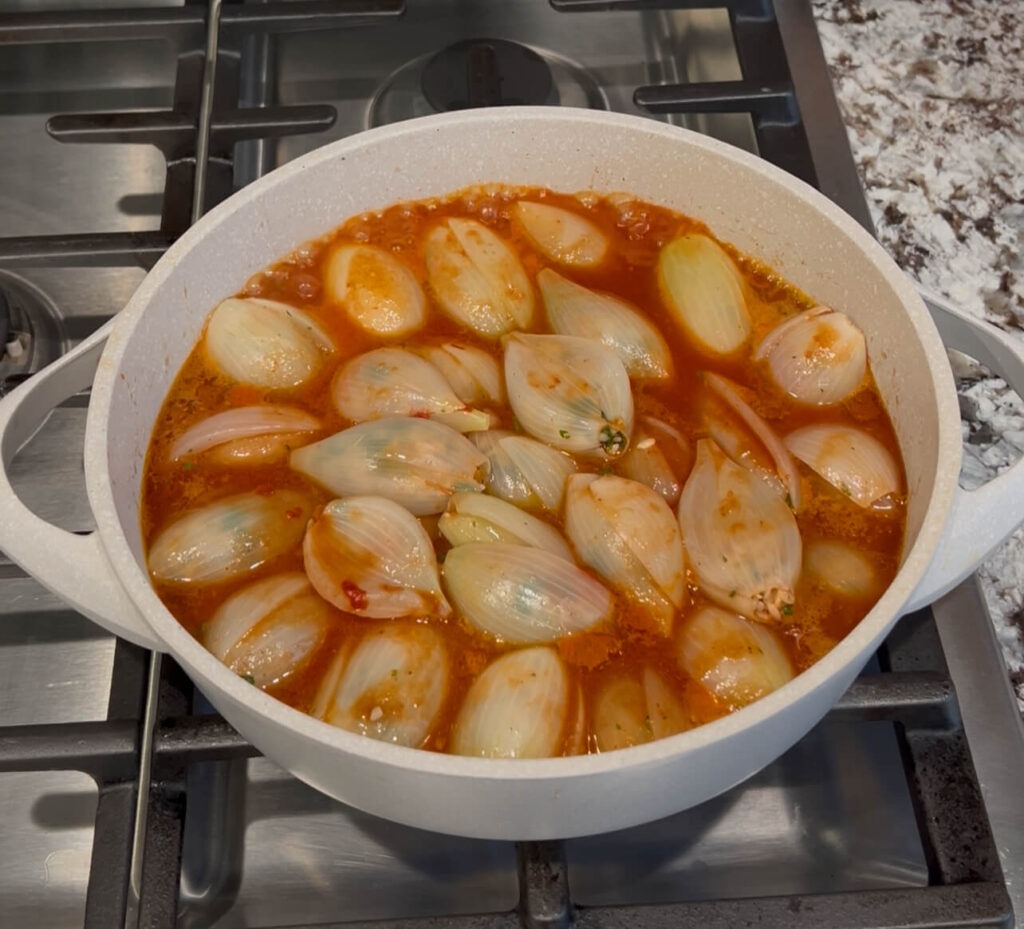 Stuffed onion cooked on the stove top 