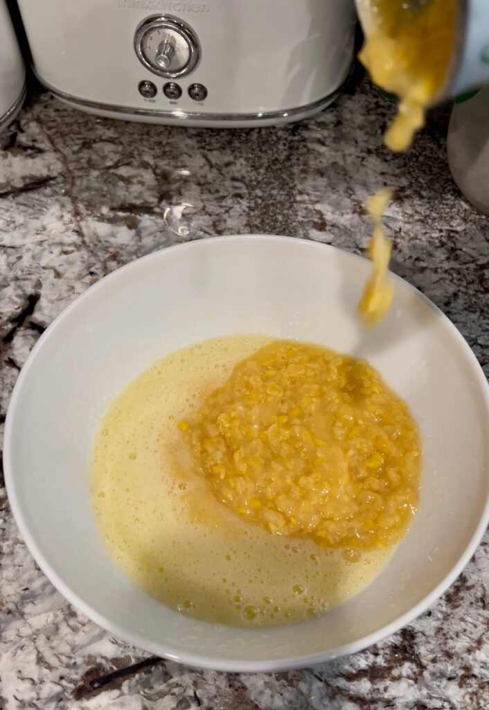 Mixing cornbread ingredients 