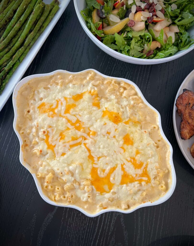 Serving baked Mac and cheese 